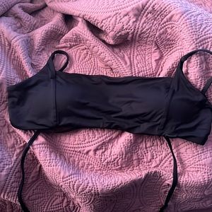 2 black roxy swim tops, no distress on any of them but don’t have bottoms